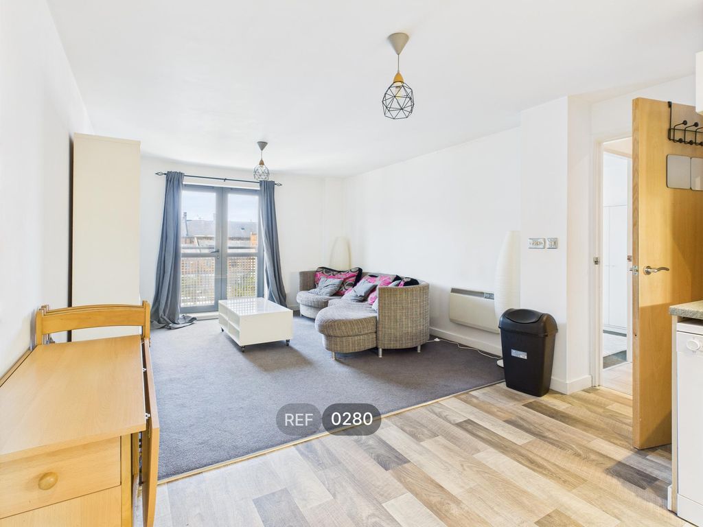 Property photo 3 of 12 Kitchen & Living Area