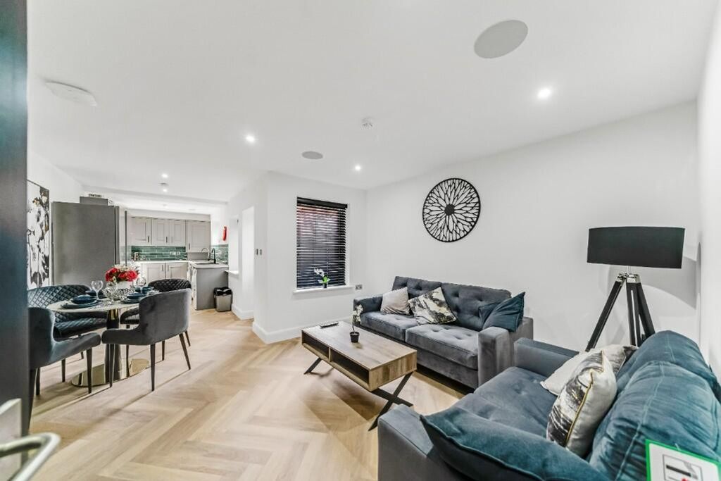 Property photo 2 of 11 A Stylish And Contemporary Living Room Featuring A...