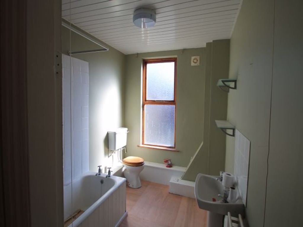 Property photo 2 of 12 Bright And Clean Bathroom With Natural Light Strea...