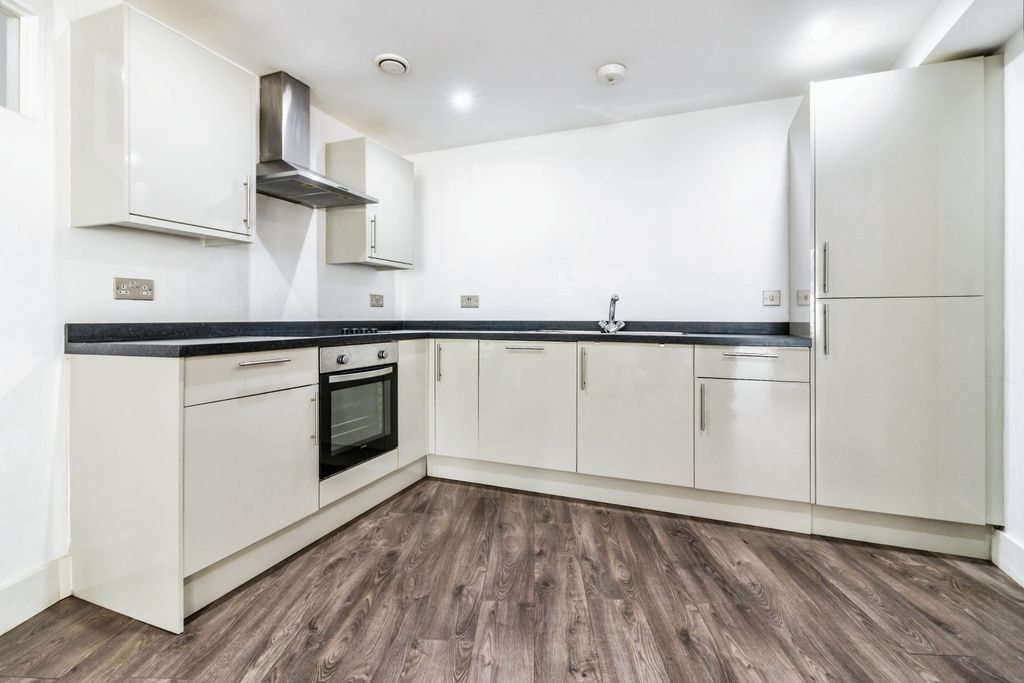 Property photo 3 of 9 Kitchen Area