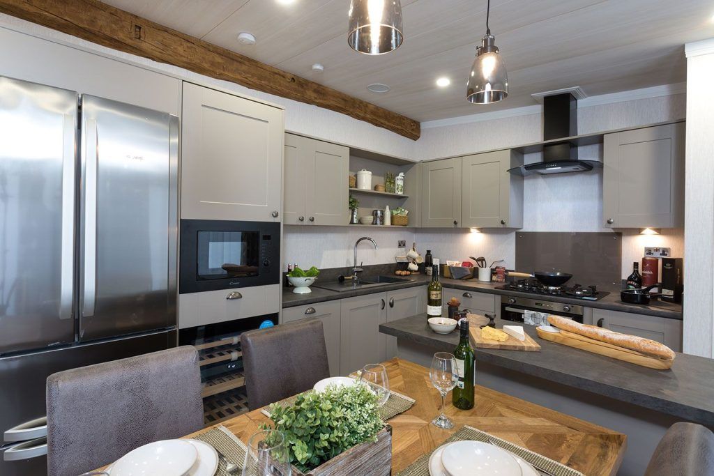 Property photo 2 of 7 Luxury Kitchen With Island, Dining Area And Integrated Appliances