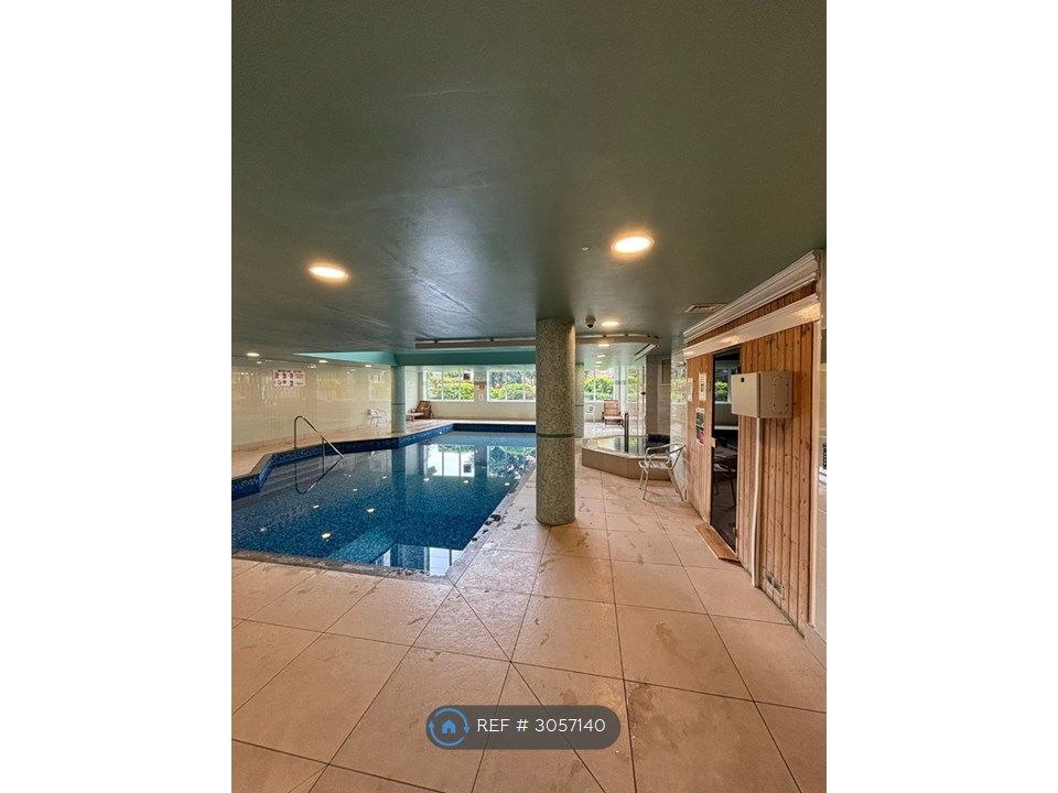 Property photo 2 of 17 Communal Swimming Pool