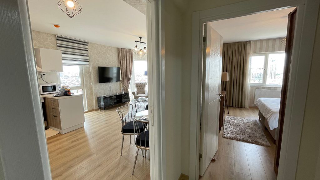 Property photo 2 of 10 Modern Istanbul Apartments For Sale With On-Complex Facilities - Hallway Into The Lounge And Bedroom