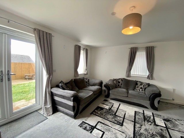 Property photo 3 of 18 Front