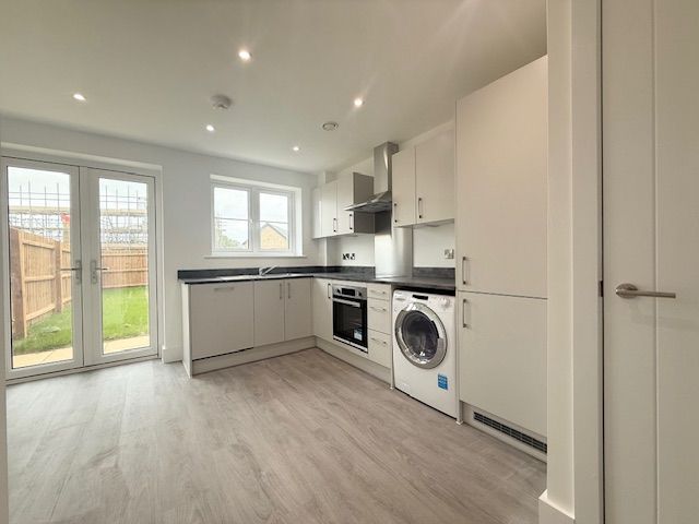 Property photo 2 of 12 Kitchen