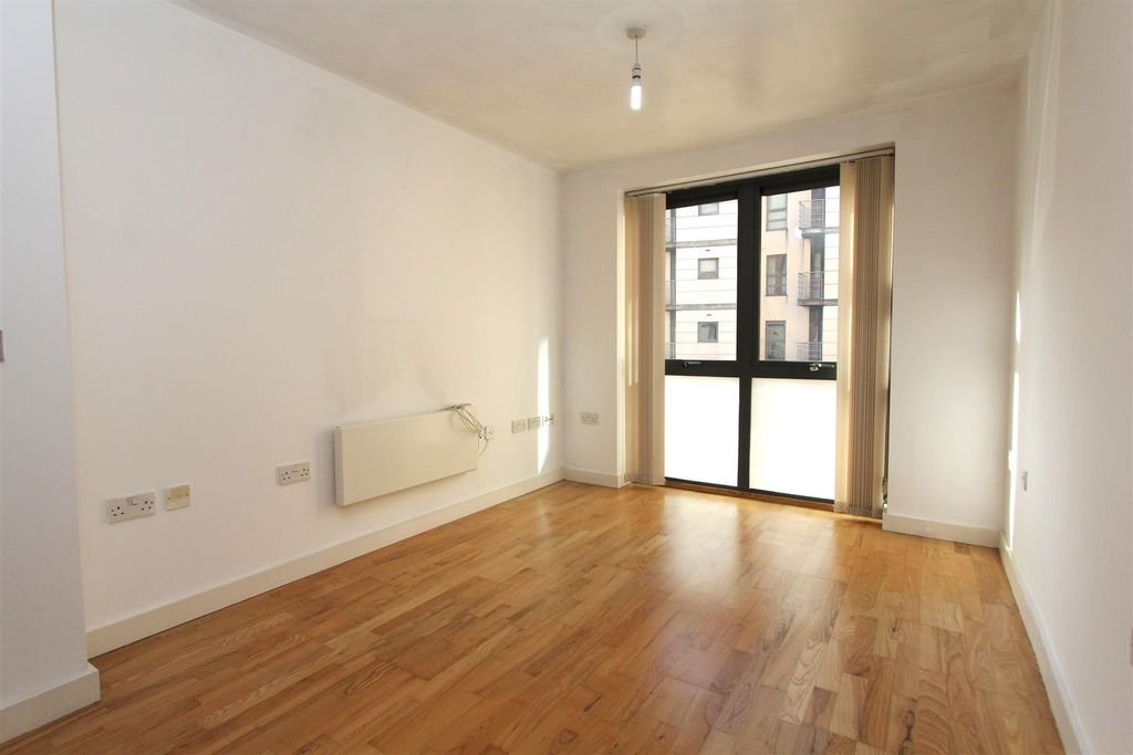 Property photo 3 of 8 Bright Modern Living Area With Wooden Floors...