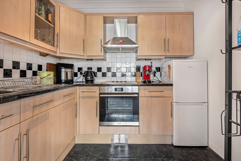 Property photo 3 of 13 Kitchen