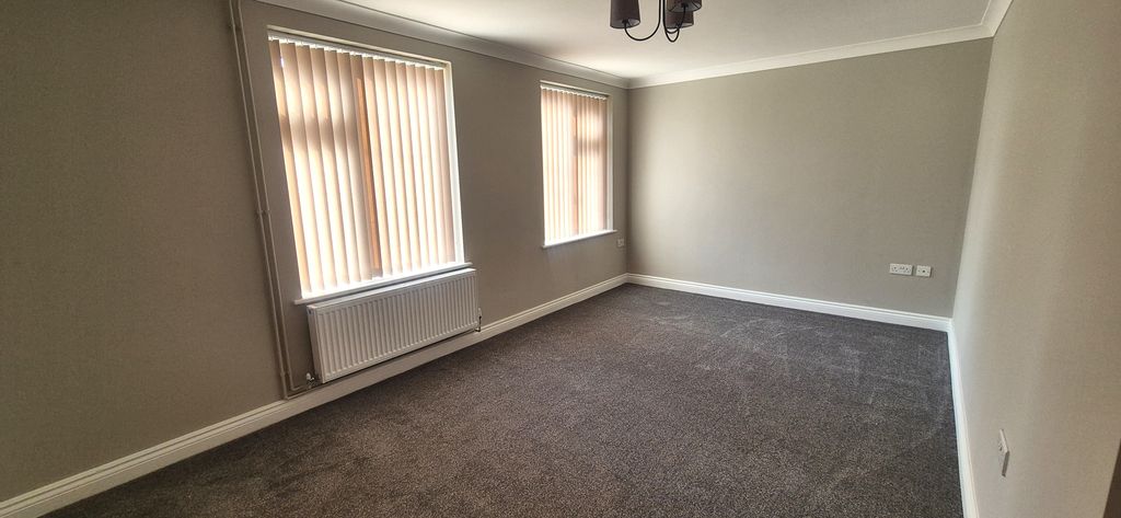 Property photo 2 of 8 Living Room