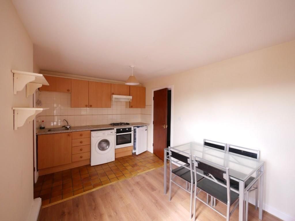 Property photo 2 of 7 A Bright And Tidy Kitchen Area Featuring Modern Ap...