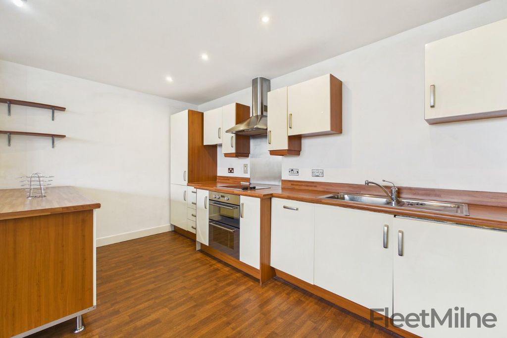 Property photo 3 of 13 Kitchen