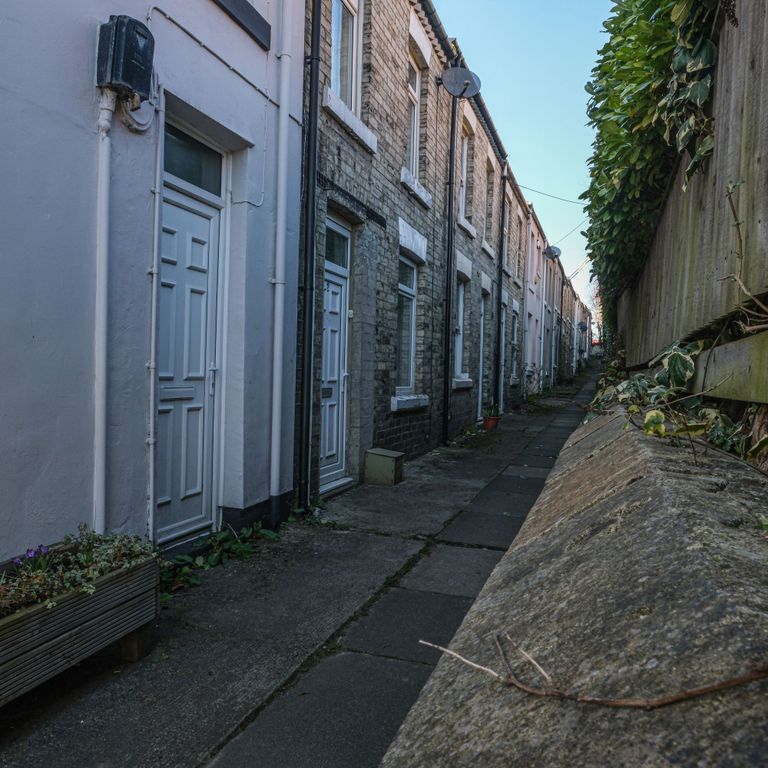 Property photo 3 of 4 A Row Of Traditional Terraced Houses With Neat Whi...