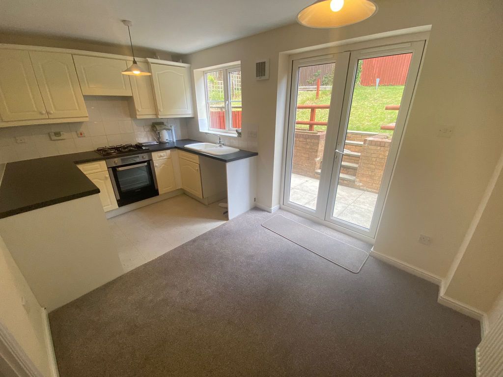 Property photo 3 of 8 Kitchen & Dining Room