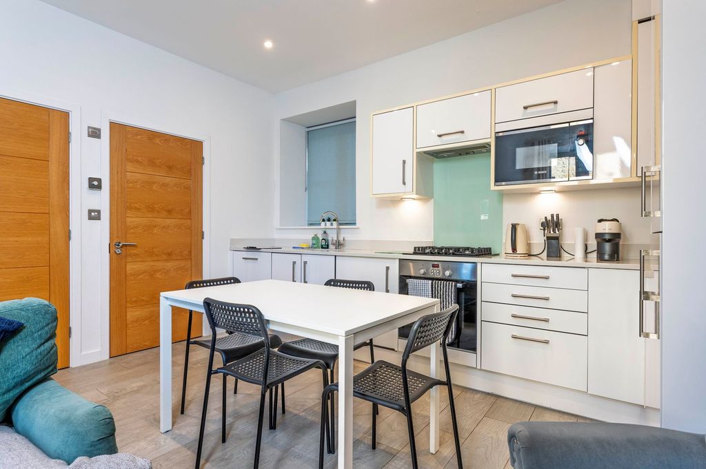 Property photo 3 of 12 Kitchen