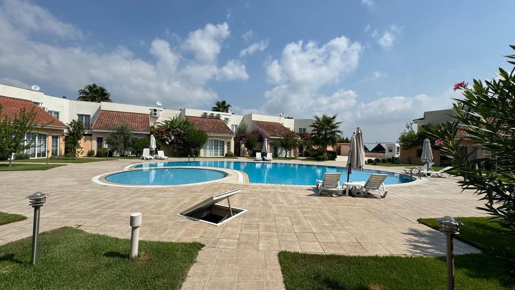 Property photo 1 of 12 An Immaculate Apartment In Belek, Antalya For Sale - A Pretty Complex With A Communal Pool