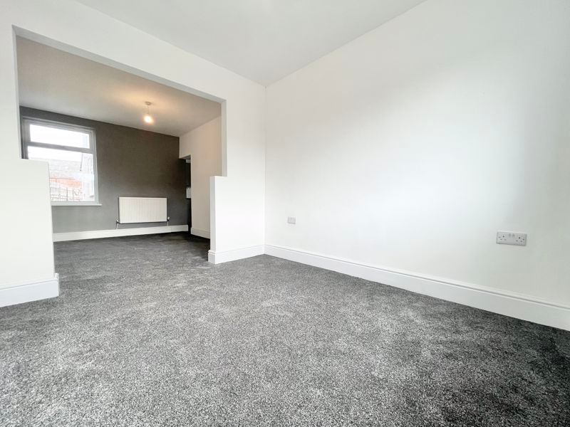Property photo 3 of 11 Living Room Alt View
