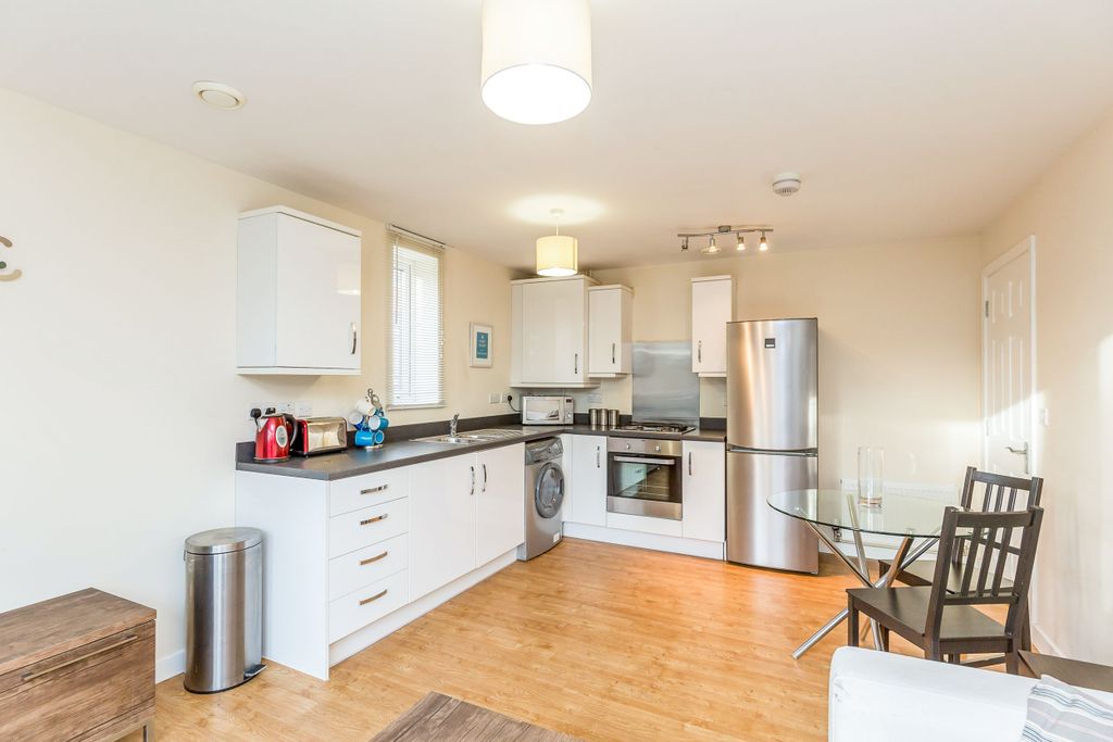 Property photo 2 of 9 Kitchen Area