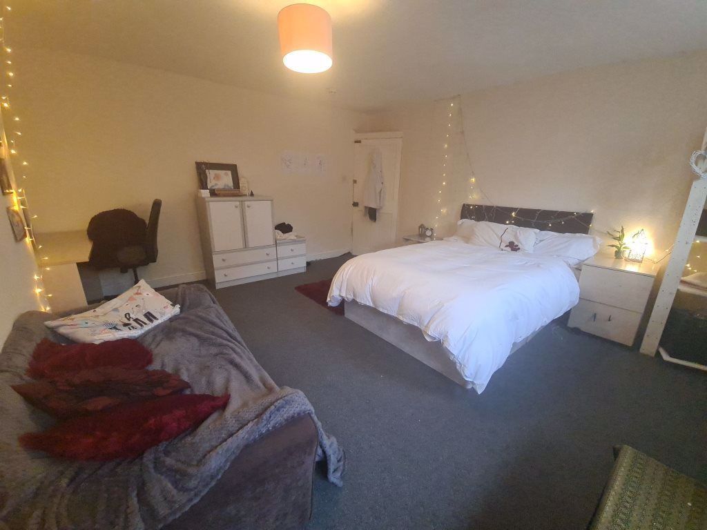 Property photo 3 of 17 A Spacious And Well-Lit Master Bedroom Featuring A...