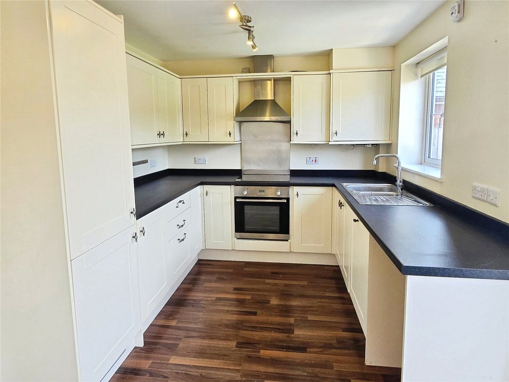 Property photo 3 of 19 Dining Kitchen