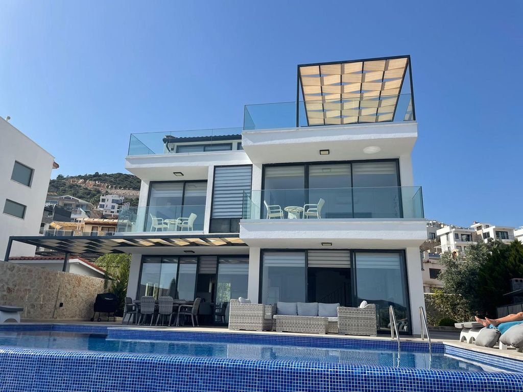 Property photo 1 of 22 Deluxe Kalkan Property Is For Sale - Main View Of The Immaculate Triplex Villa With Infinity Pool