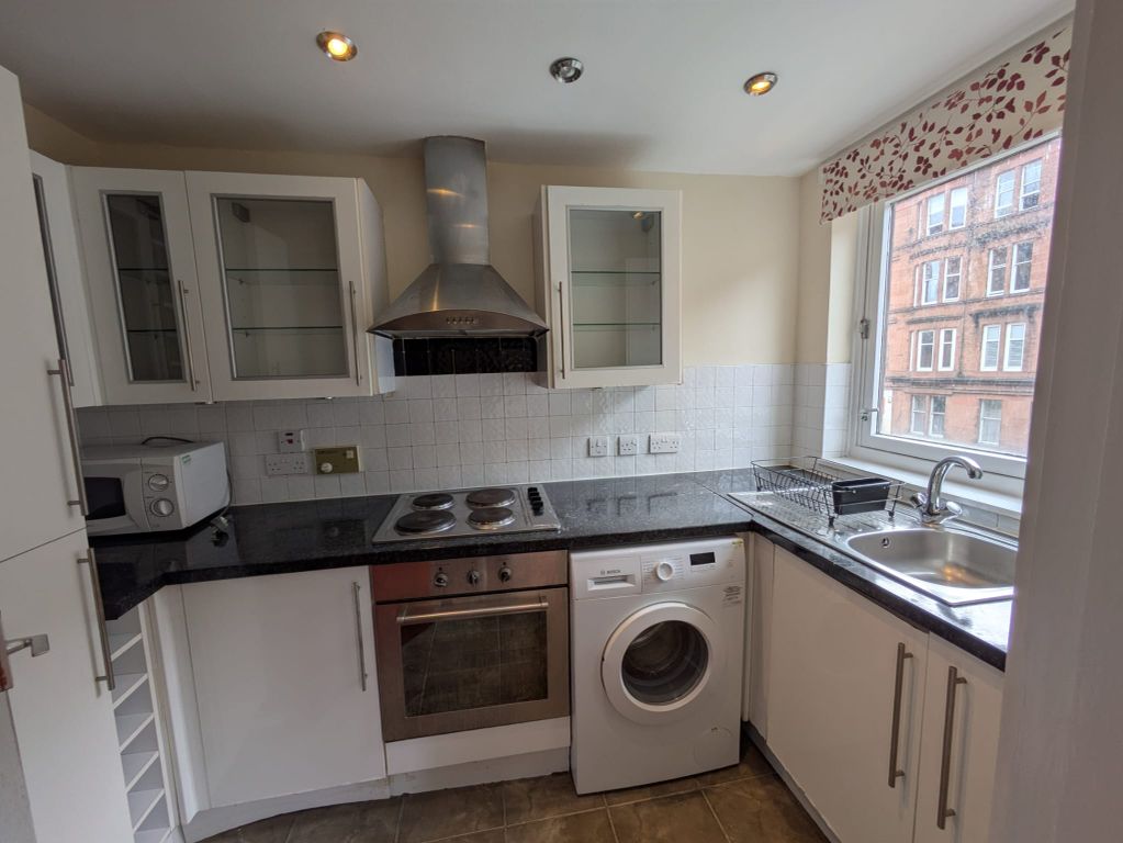 Property photo 3 of 6 Kitchen