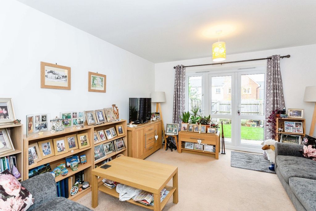 Property photo 2 of 8 Living