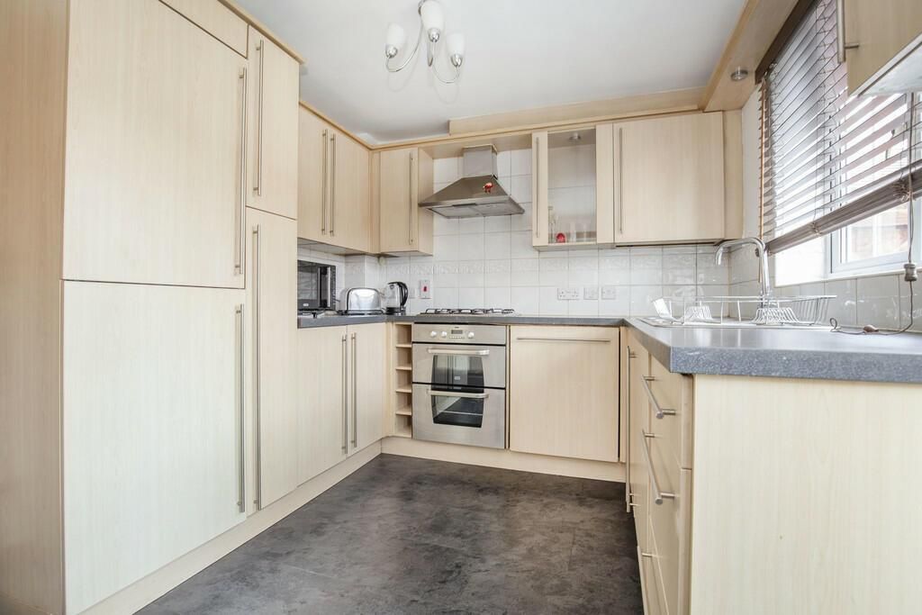 Property photo 2 of 12 Kitchen Area