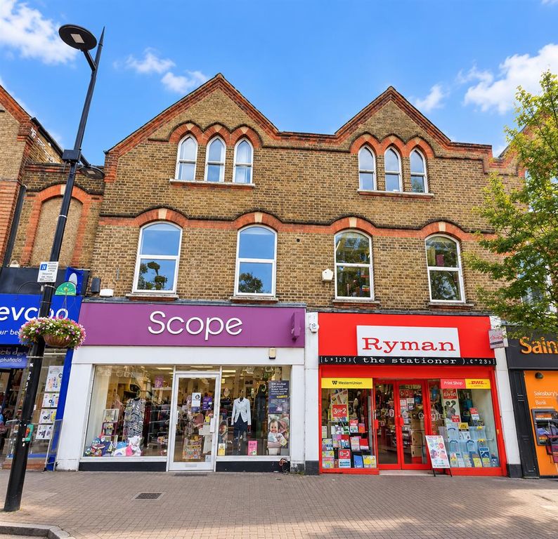 Property photo 1 of 1 Victorian High Street Shops In Daylight.Png