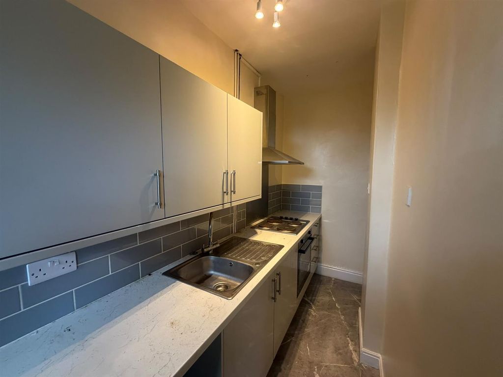 Property photo 3 of 8 Kitchen
