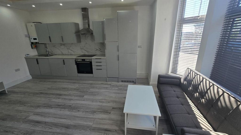 Property photo 3 of 11 Bright Open-Plan Living Area With A Modern Fitted ...