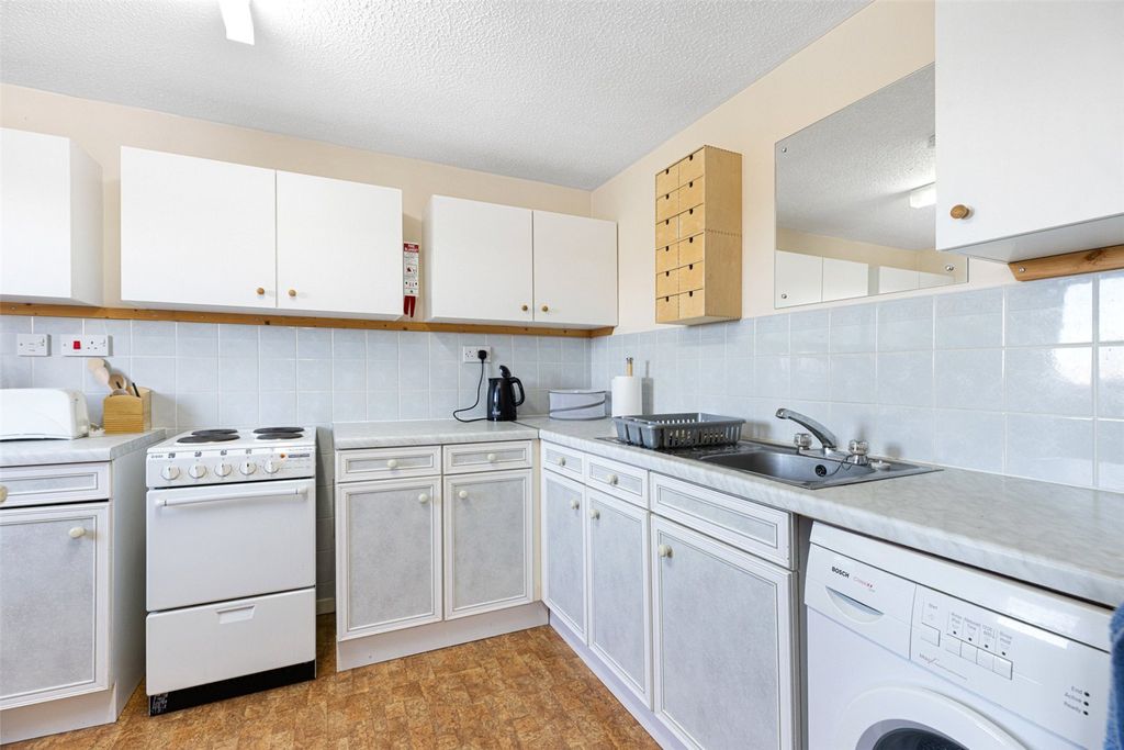 Property photo 3 of 12 Kitchen