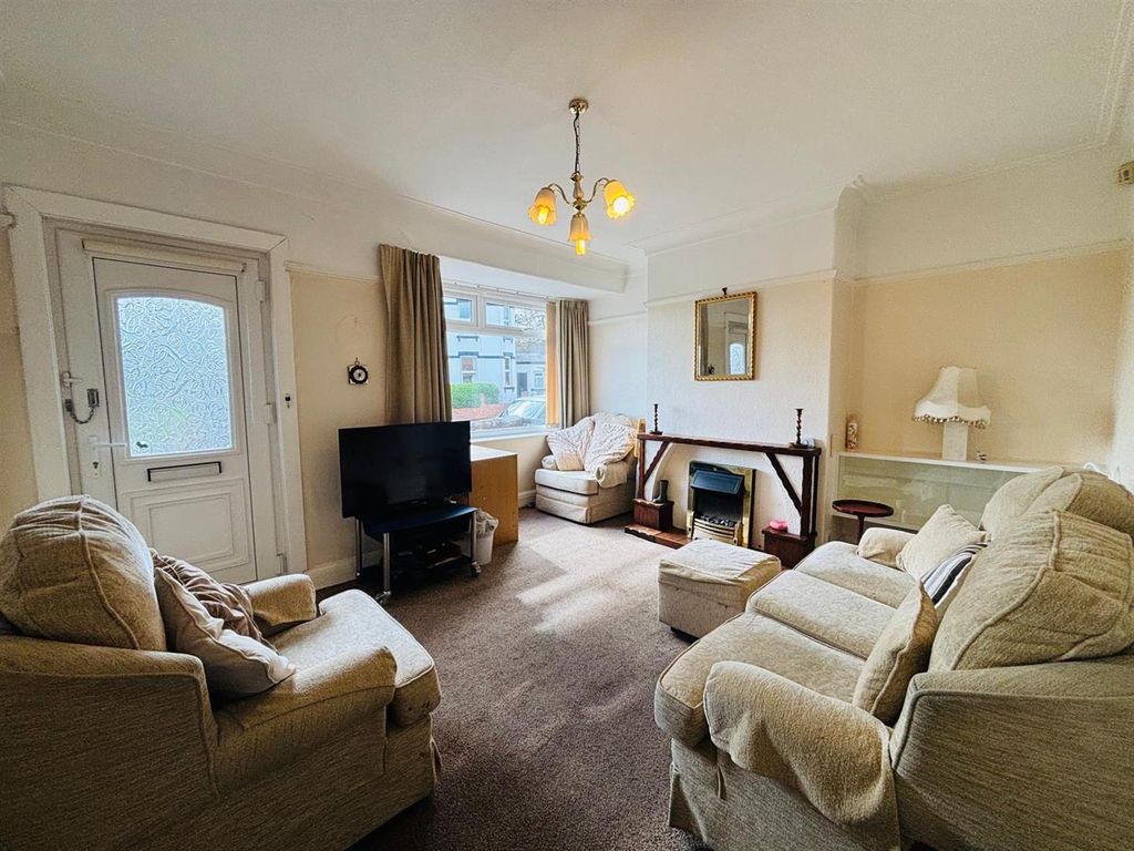 Property photo 2 of 11 Living Room: