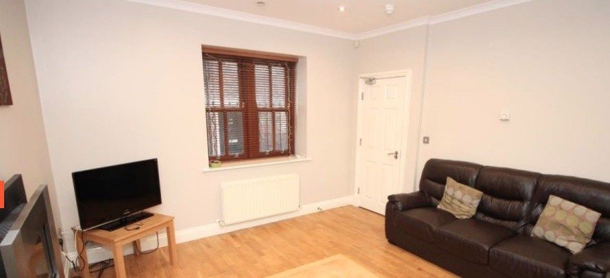 Property photo 3 of 7 Well-Presented Living Room With Wood Flooring, A c...