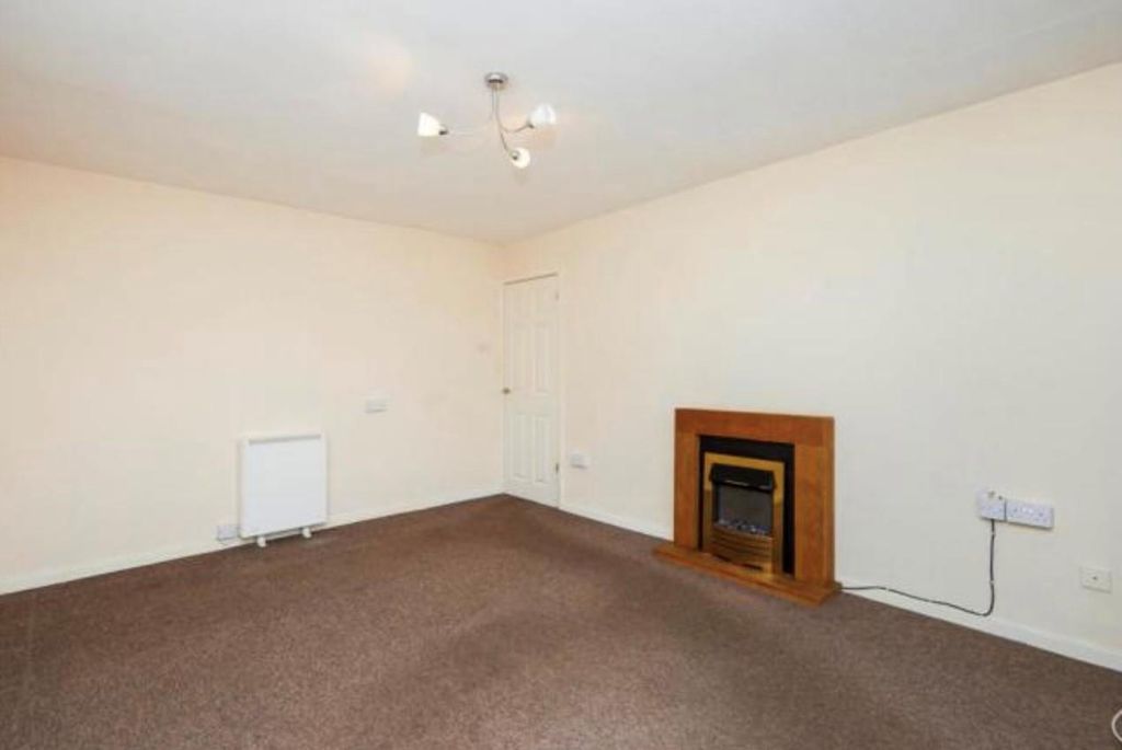 Property photo 2 of 8 Living Room