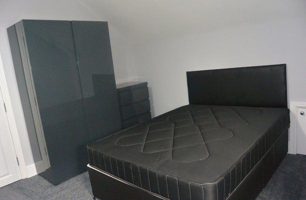 Property photo 1 of 7 A Spacious Master Bedroom Featuring A Large Bed An...