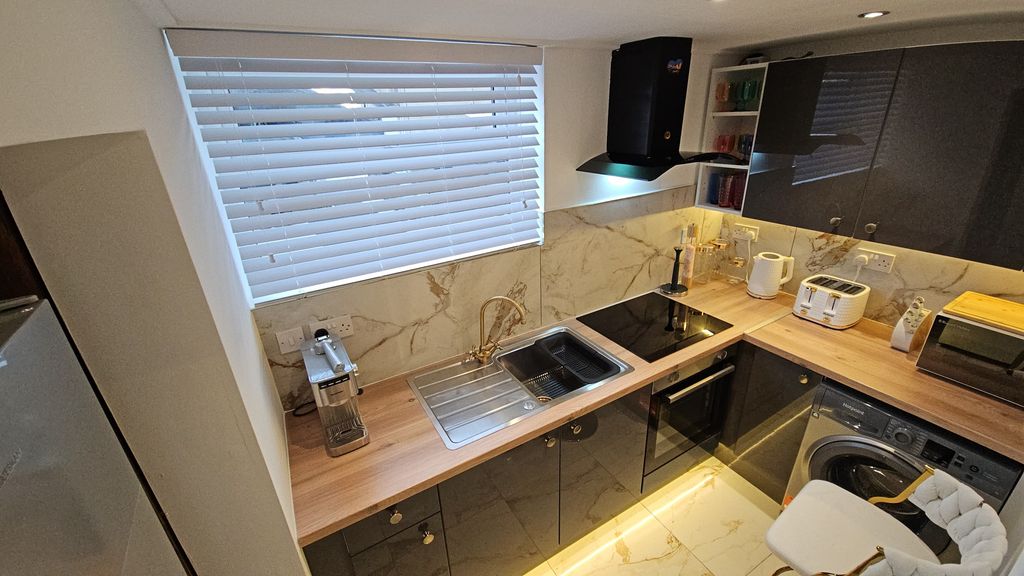 Property photo 3 of 12 Kitchen 