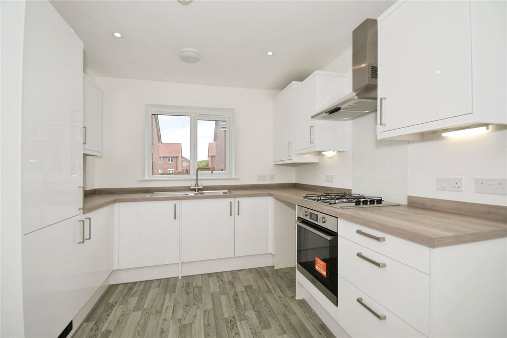 Property photo 2 of 8 Typical Kitchen