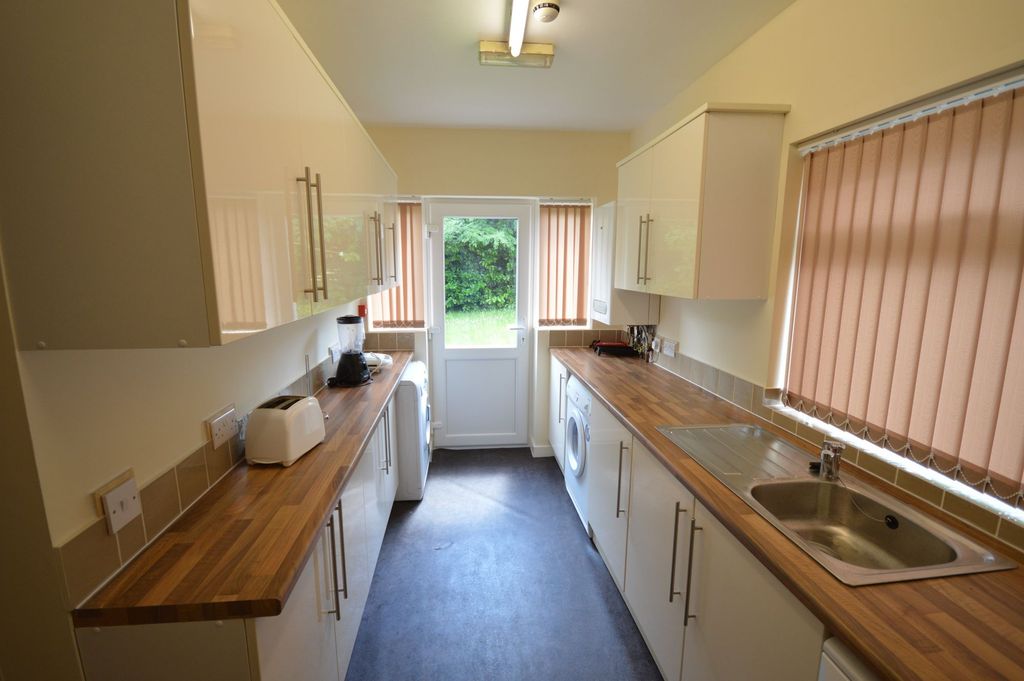 Property photo 1 of 7 Bright And Well-Maintained Galley Kitchen With Amp...