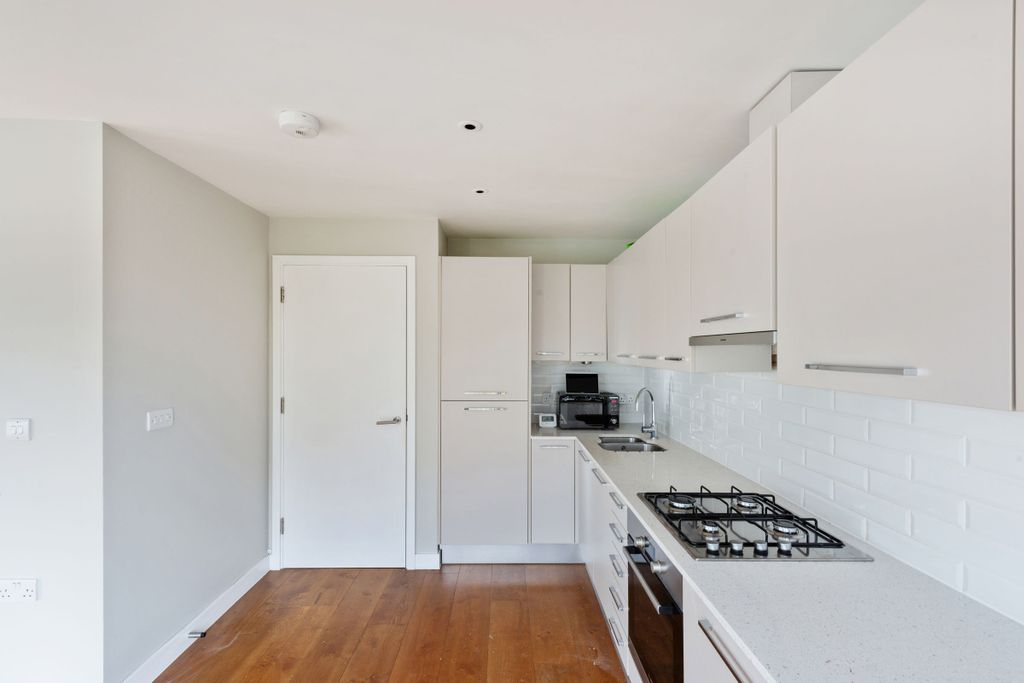 Property photo 2 of 18 Kitchen