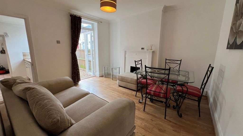 Property photo 2 of 48 Bright Living Area With Stylish Dining Set...