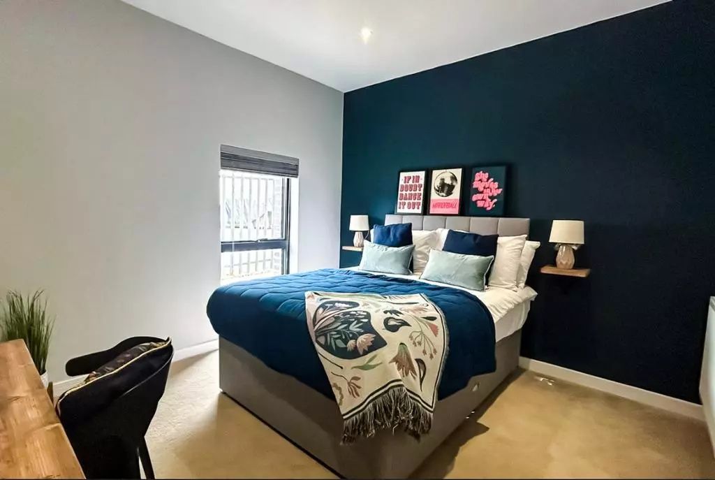 Property photo 3 of 6 A Stylish Master Bedroom Featuring A Comfortable d...