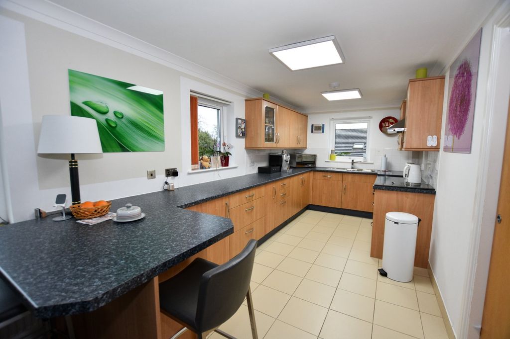 Property photo 3 of 12 Kitchen