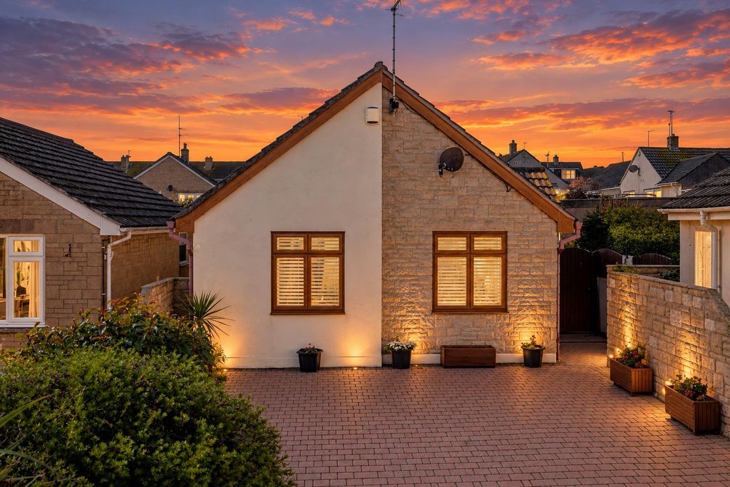 Property photo 1 of 28 Twilight Bungalow Under A Vibrant Sunset.Png