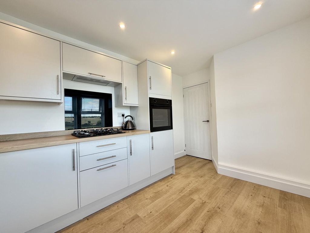 Property photo 3 of 16 Kitchen