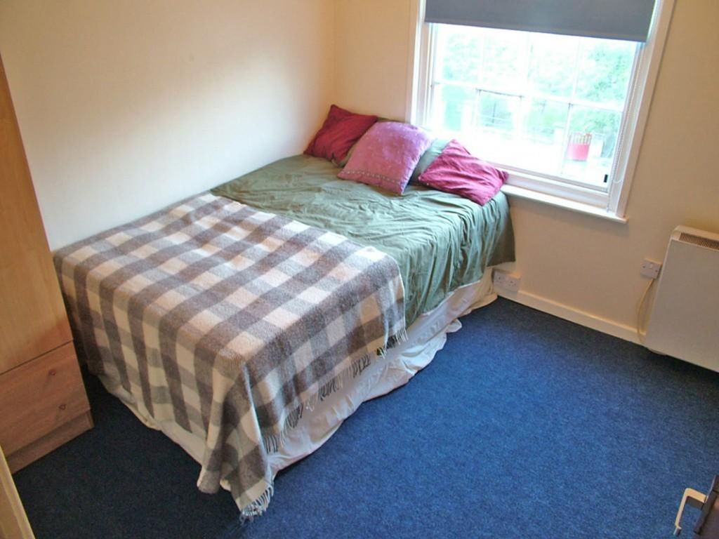 Property photo 2 of 2 Cozy Double Bedroom Featuring A Comfortable Bed Ad...