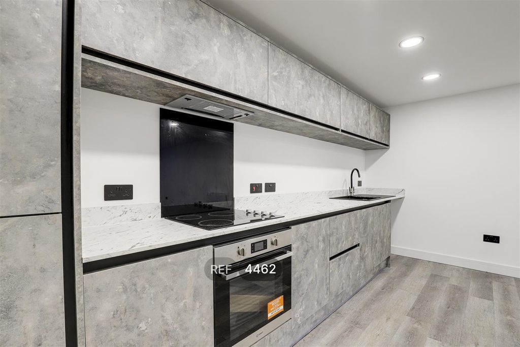 Property photo 2 of 9 Kitchen / Living Area