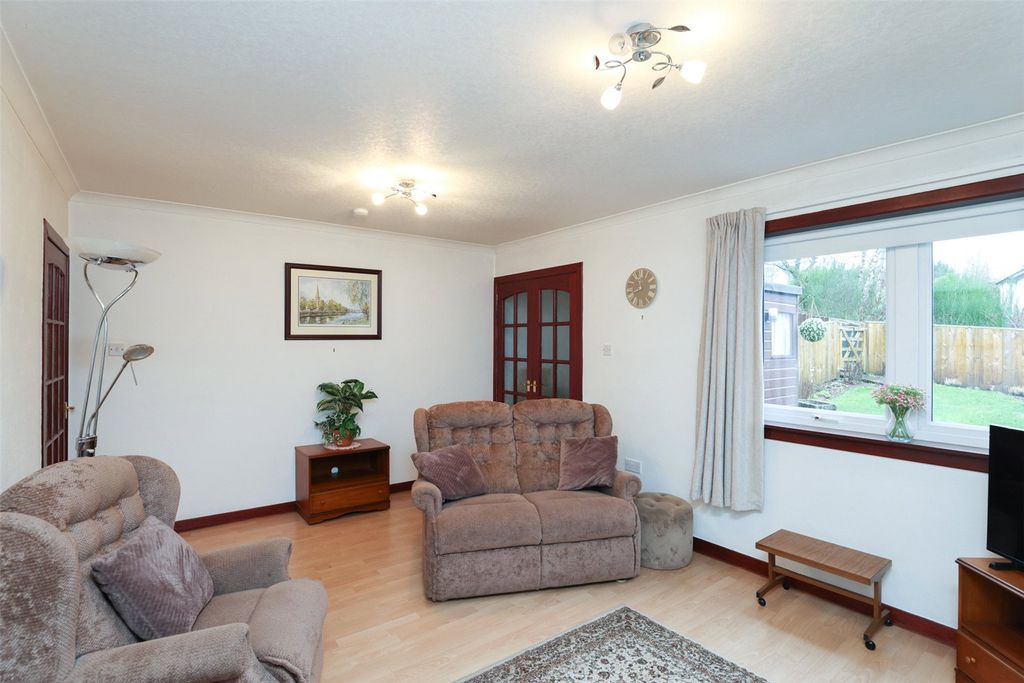 Property photo 3 of 12 Living Room