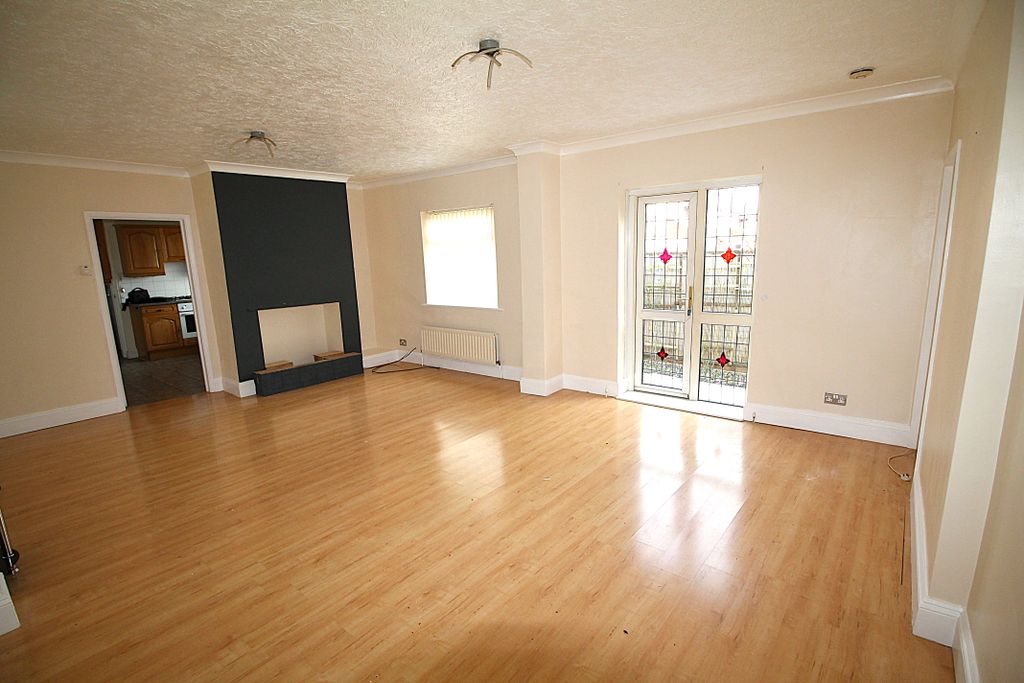 Property photo 3 of 11 Living Room 1