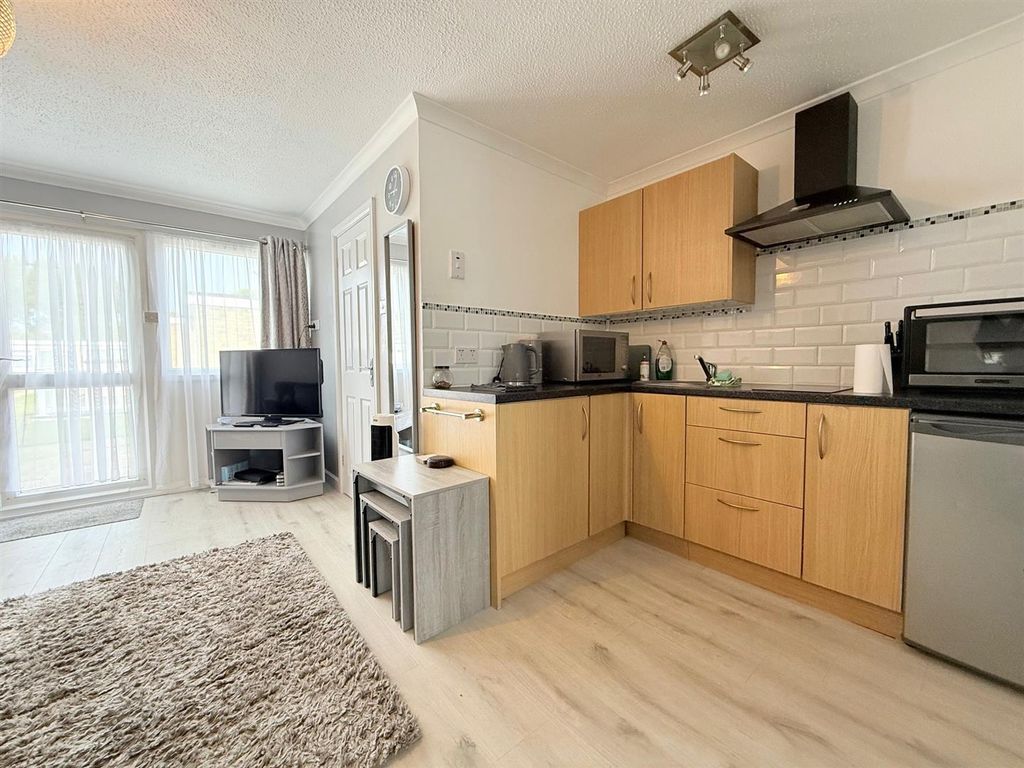 Property photo 2 of 10 Kitchen Area