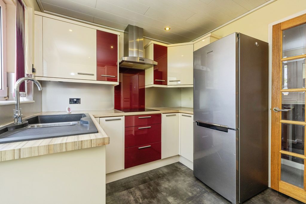Property photo 2 of 12 Kitchen