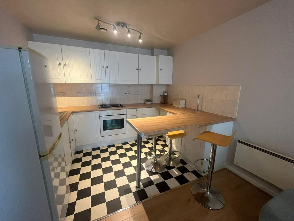 Property photo 3 of 12 Kitchen